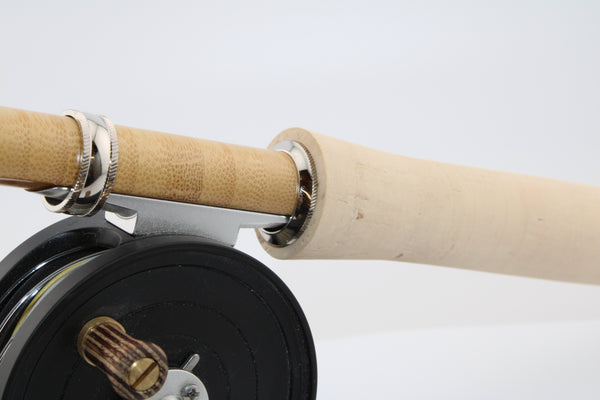 Up-locking mortised slide band reel seat in stacked bamboo with plated hardware