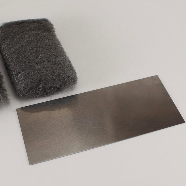 Cabinet Scraper & 0000 steel wool (bamboo rod restoration)